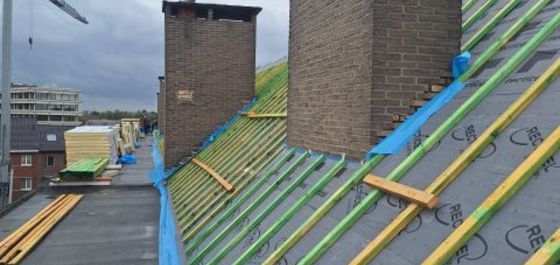 Renovatiemasterplan van Dubolimburg: dakrenovatie appartementsgebouw in Hasselt